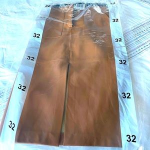 Faux leather pencil skirt midi length, brand new from Mango